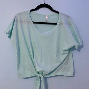 Light blue/ turquoise top, L, tight fit